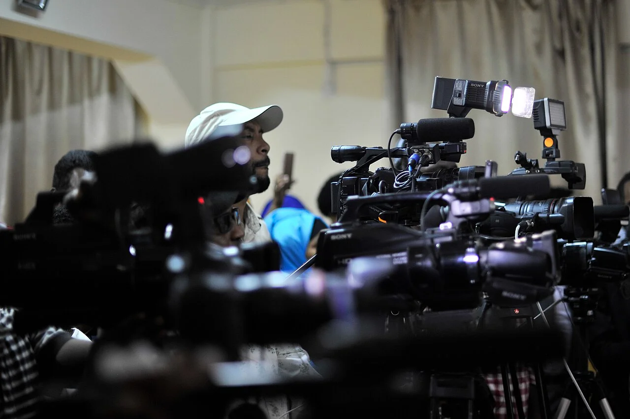 Journalists recording a press conference in Mogadishu.