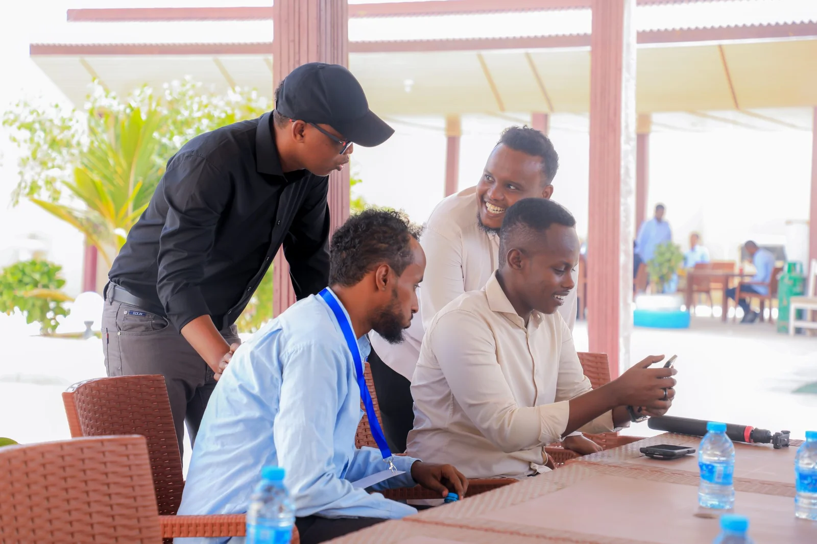 A group practising smartphone video recording and interview techniques at SNU in Mogadishu.