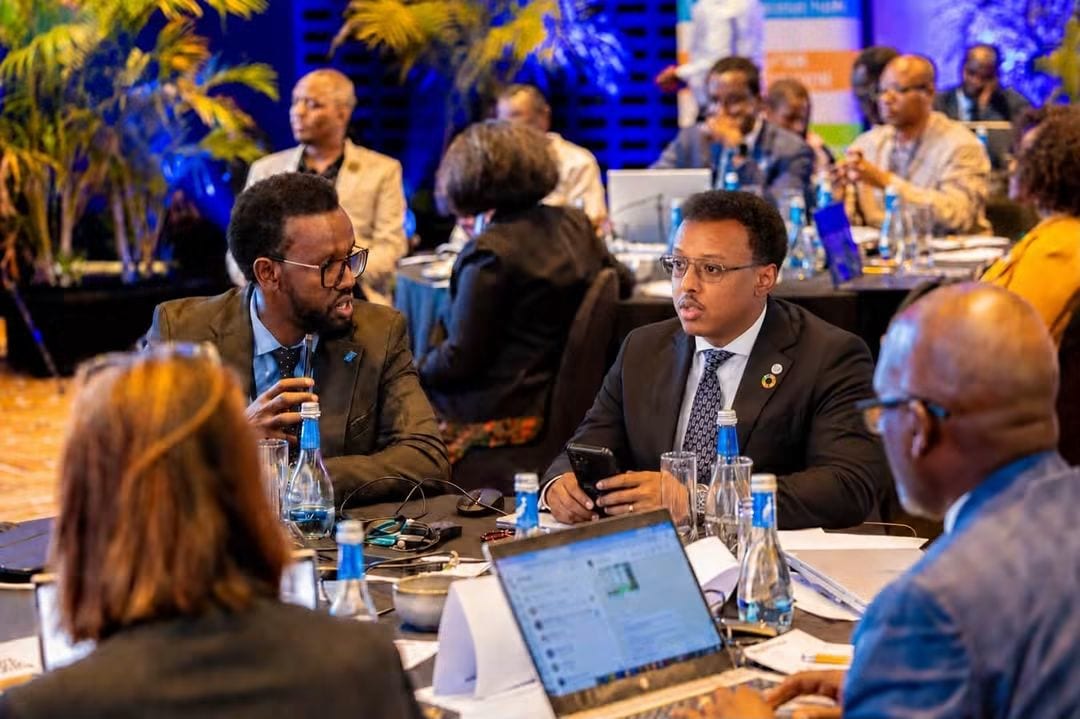 Partners in discussion at a Heen Media-covered forum