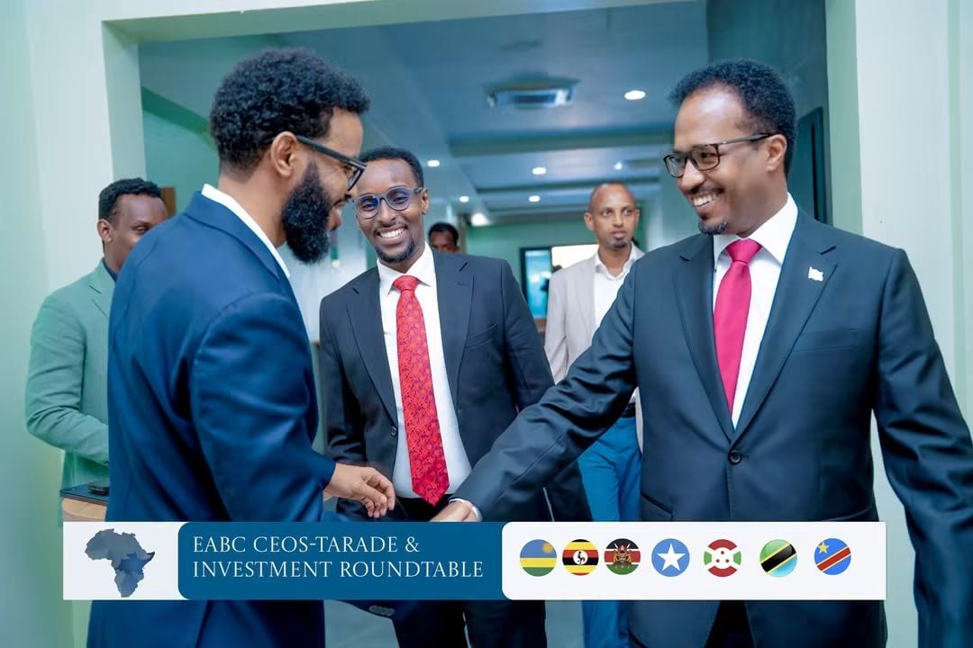 Regional business leaders greeting one another