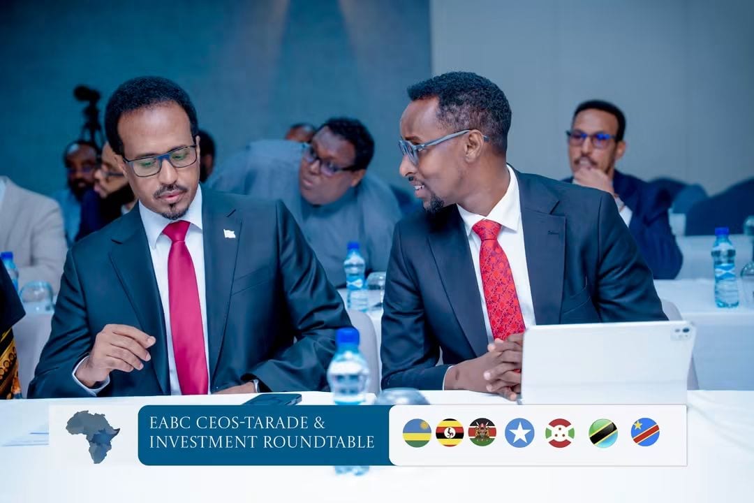 Officials in discussion at the table