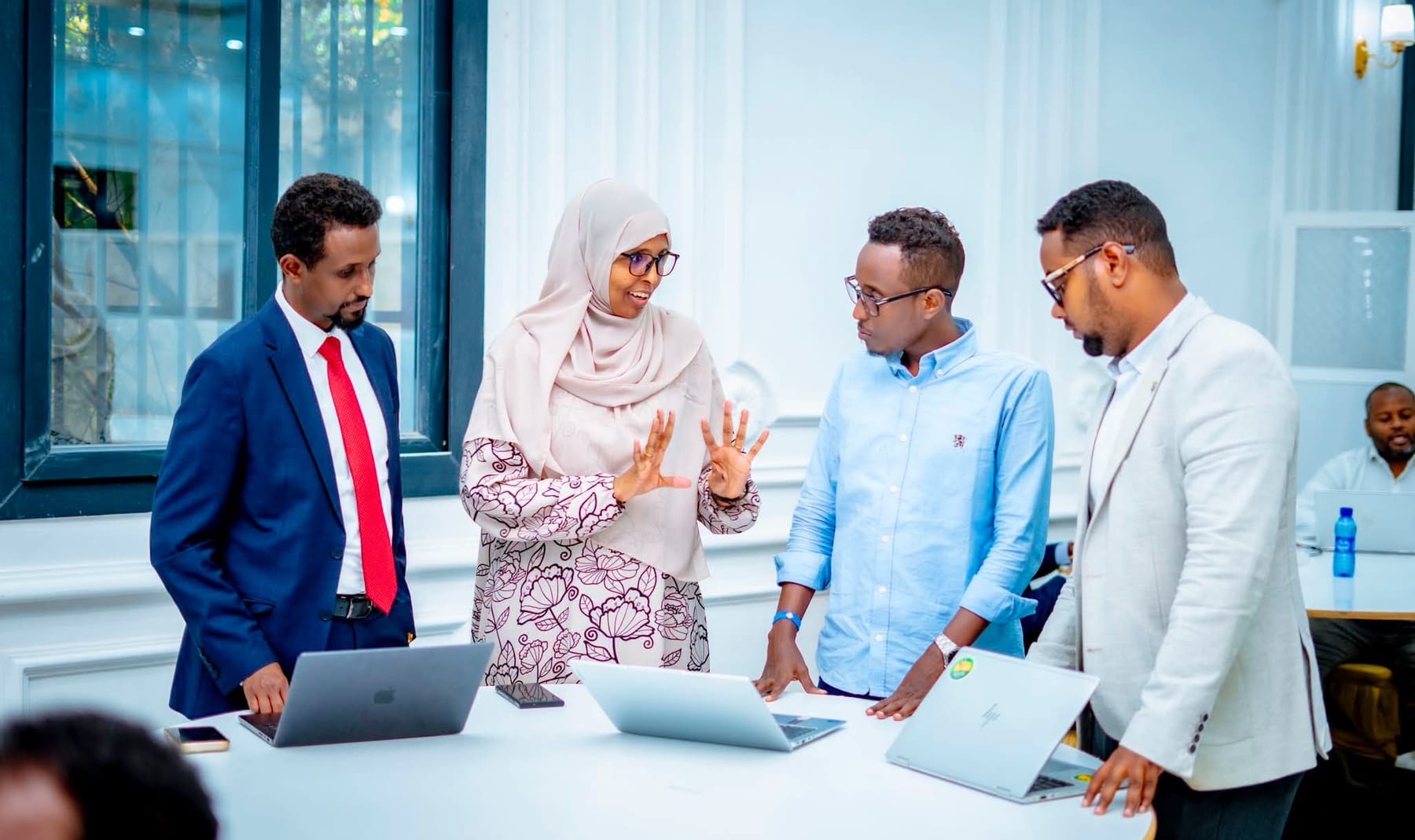 The Heen Media team planning editorial and production work together