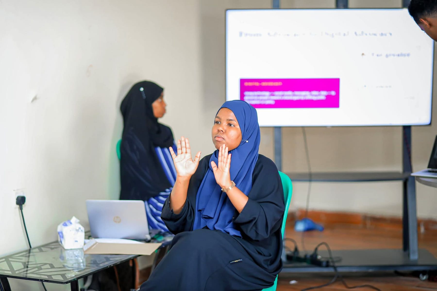 Heen Media covering a panel discussion at a development workshop